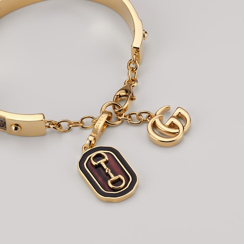 Horsebit motif charm