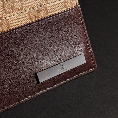 Card case with metal tag