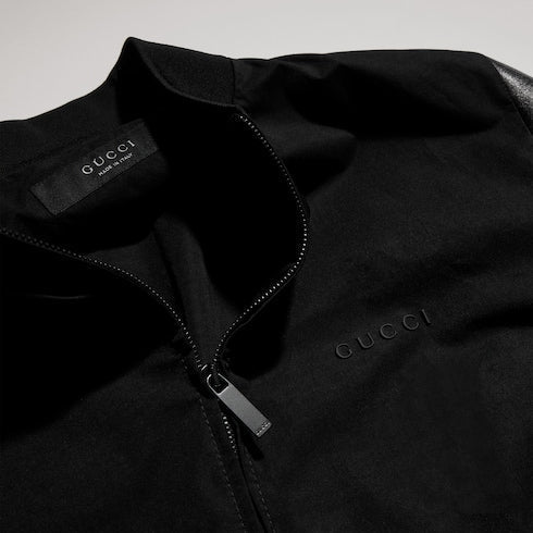 Fabric bomber jacket with nappa sleeves