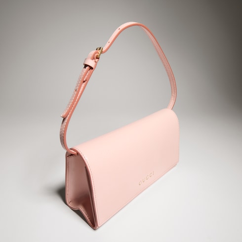 Mini pouch with Gucci lettering