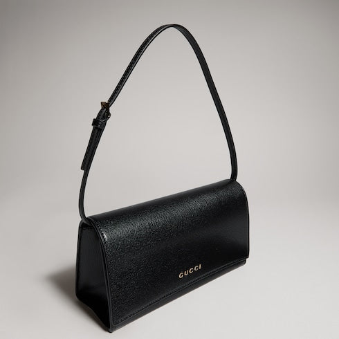 Mini pouch with Gucci lettering