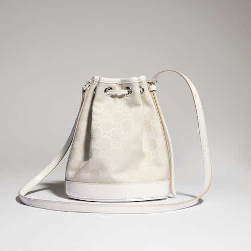 Mini bucket bag with Gucci plaque