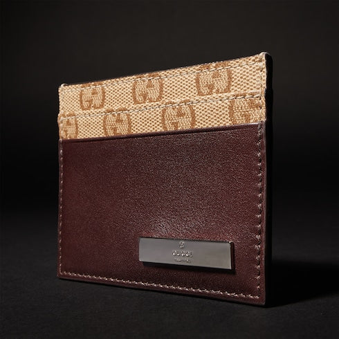Card case with metal tag