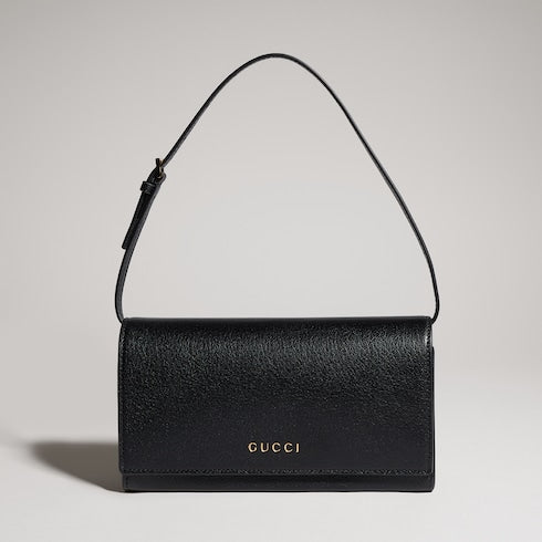 Mini pouch with Gucci lettering