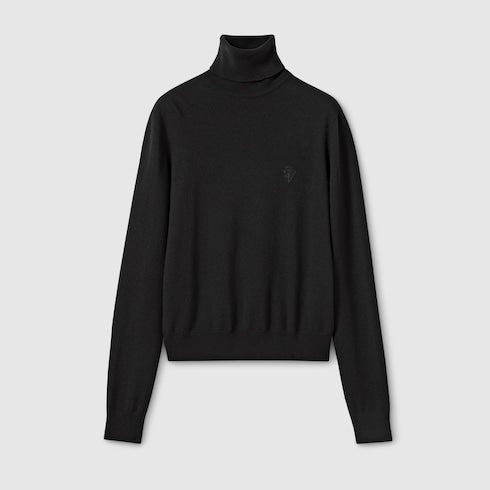 Knit wool turtleneck with embroidery