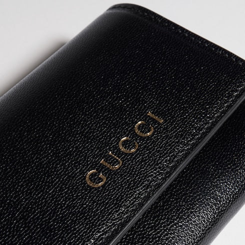 Bi-fold card case with Gucci lettering