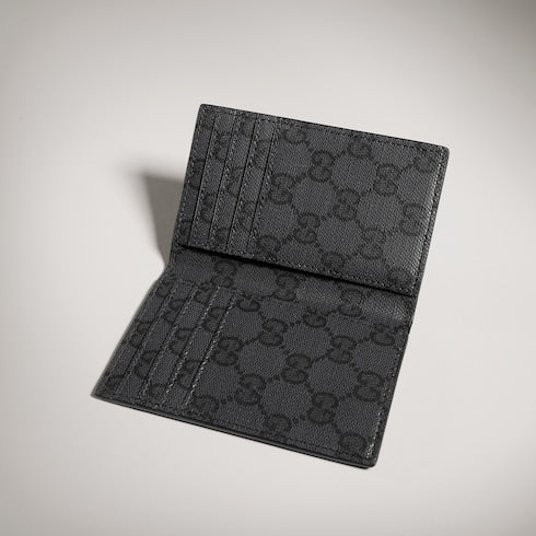 Card case with metal tag