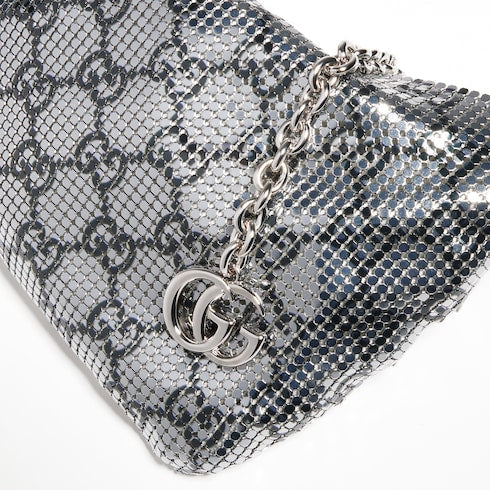 Metallic evening bag with charm
