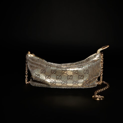 Metallic evening bag with charm