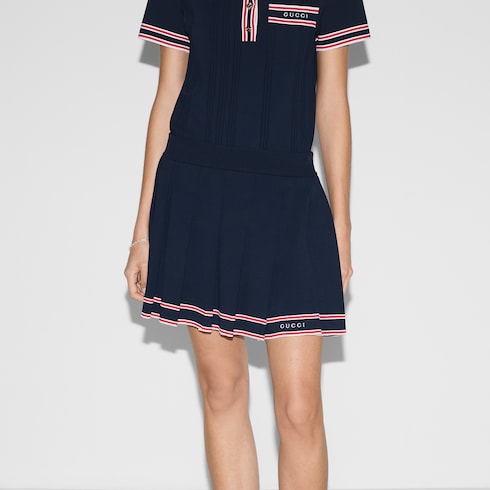 Pleated skirt with striped trim