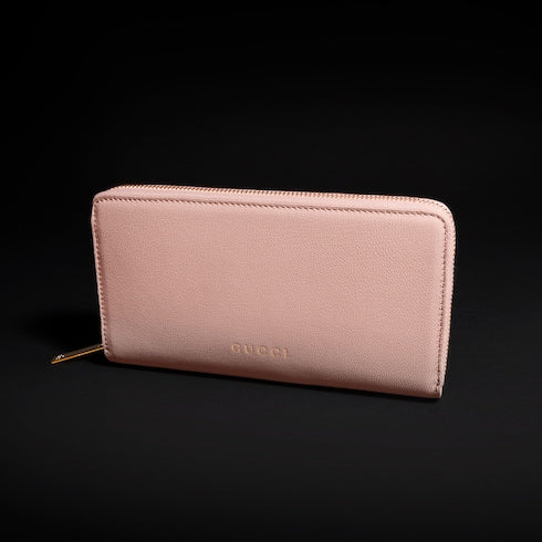 Zip around wallet with Gucci lettering