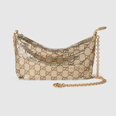Metallic evening bag with charm