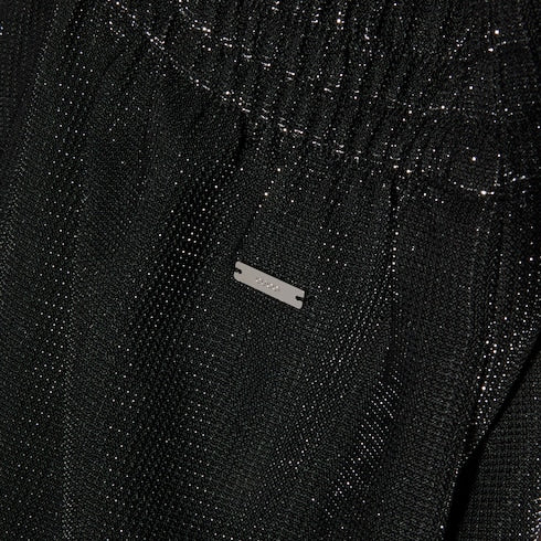 Jersey pants with iridescent effect