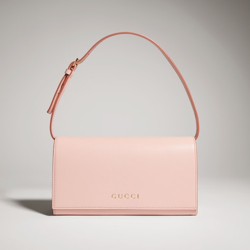 Mini pouch with Gucci lettering