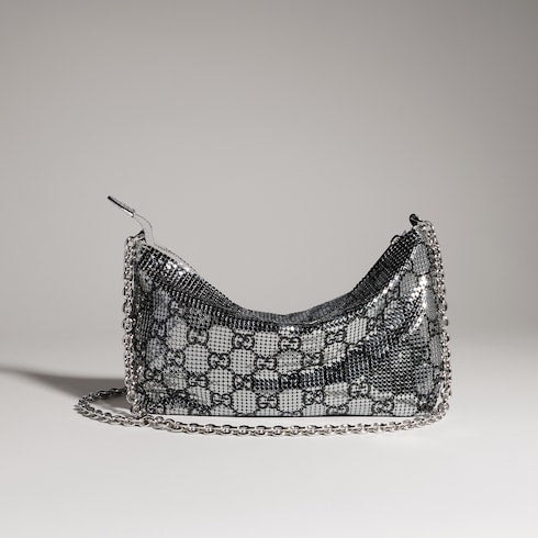 Metallic evening bag with charm
