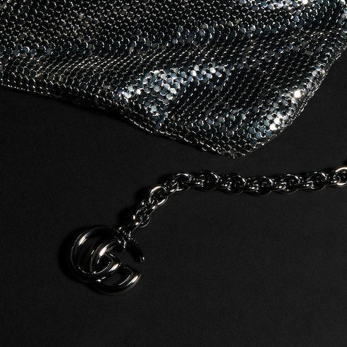 Metallic evening bag with charm