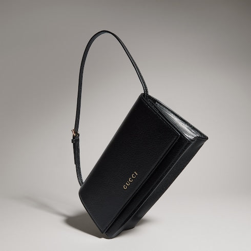 Mini pouch with Gucci lettering