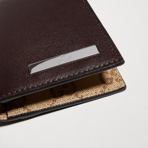 Card case with metal tag