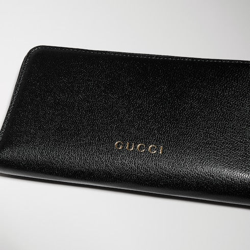 Zip around wallet with Gucci lettering