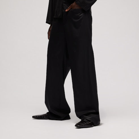 Light wool pants with chintzed finish