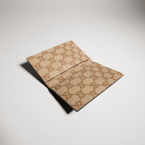 Card case with metal tag