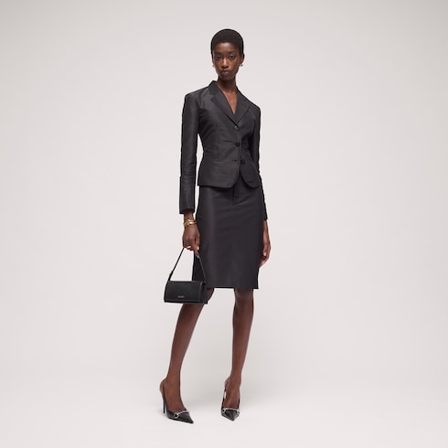 Mini pouch with Gucci lettering