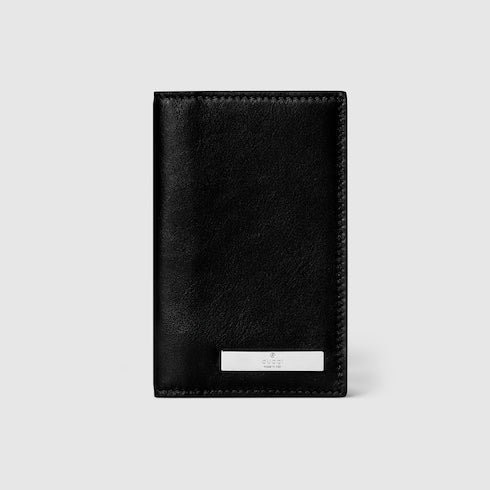 Card case with metal tag