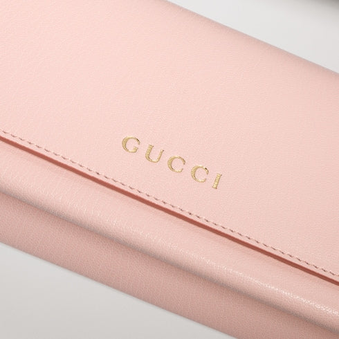 Mini pouch with Gucci lettering