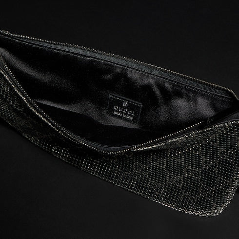 Metallic evening bag with charm