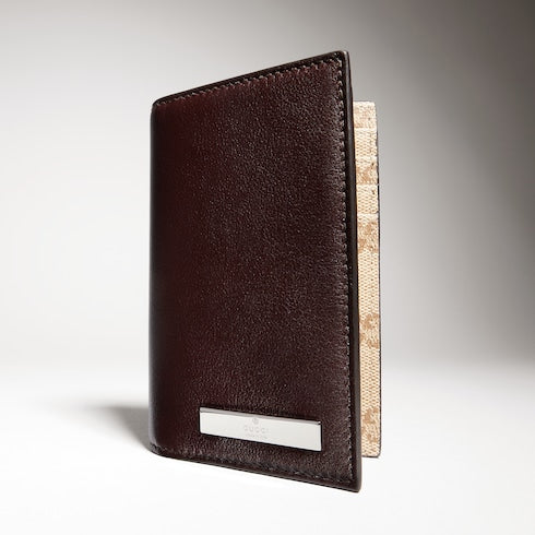 Card case with metal tag