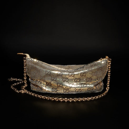 Metallic evening bag with charm