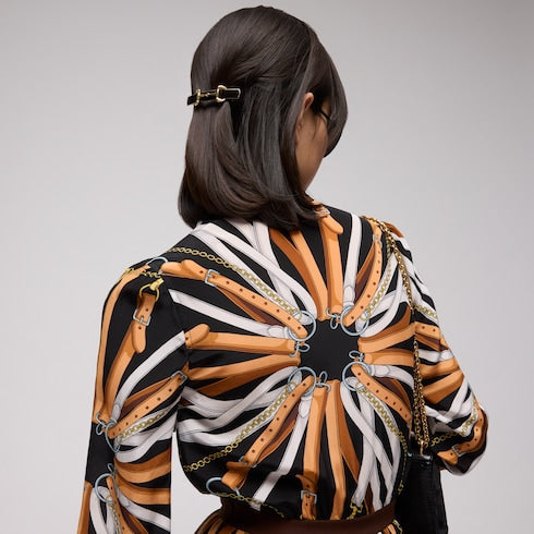 Horsebit hair clip with enamel