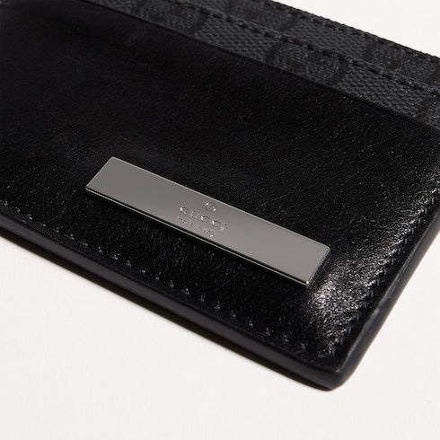 Card case with metal tag