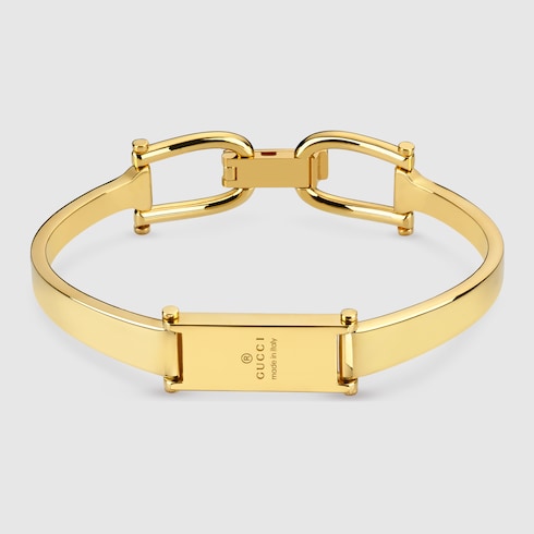 Stirrup motif bangle bracelet