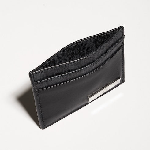 Card case with metal tag