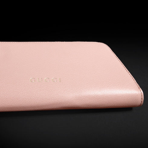 Zip around wallet with Gucci lettering