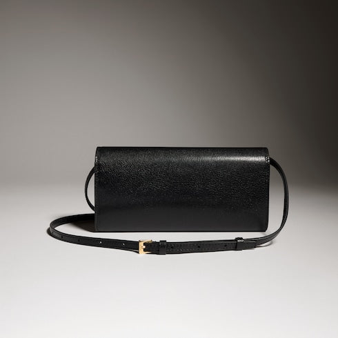 Wallet with strap and Gucci lettering