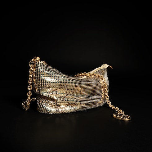 Metallic evening bag with charm